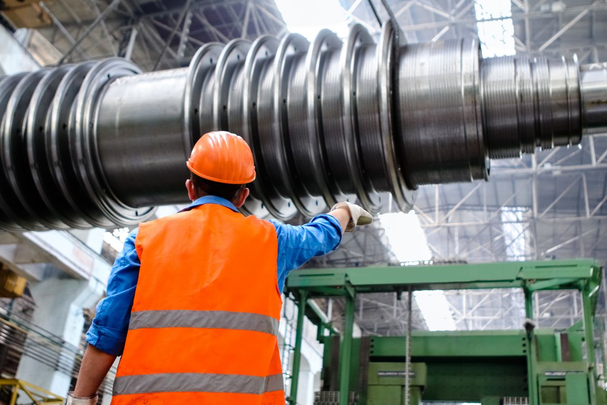 Engineer on site wearing a hard hat